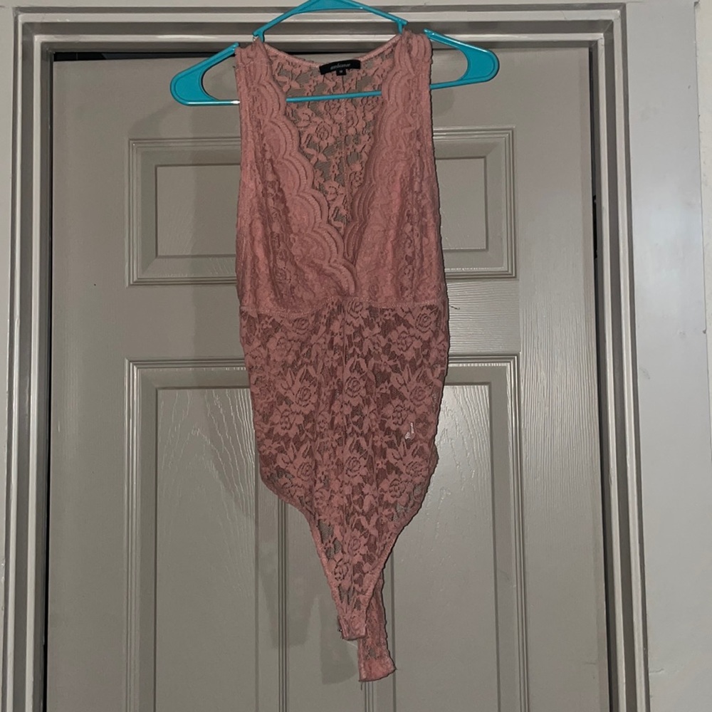 Rose lace body suit.